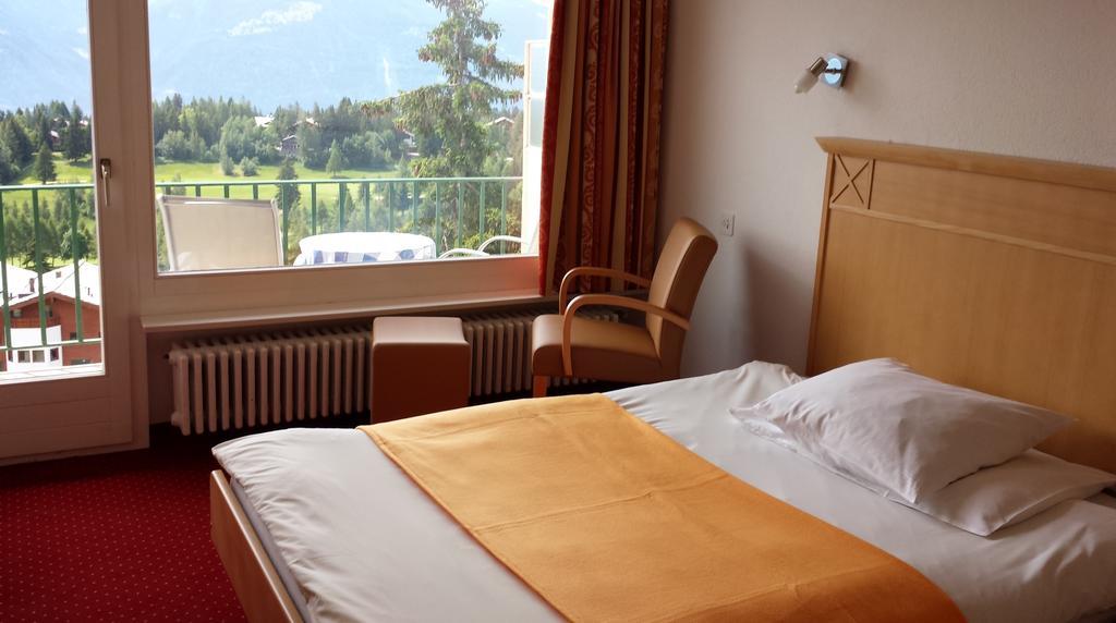 Superior Einzelzimmer mit Balkon und Bergblick