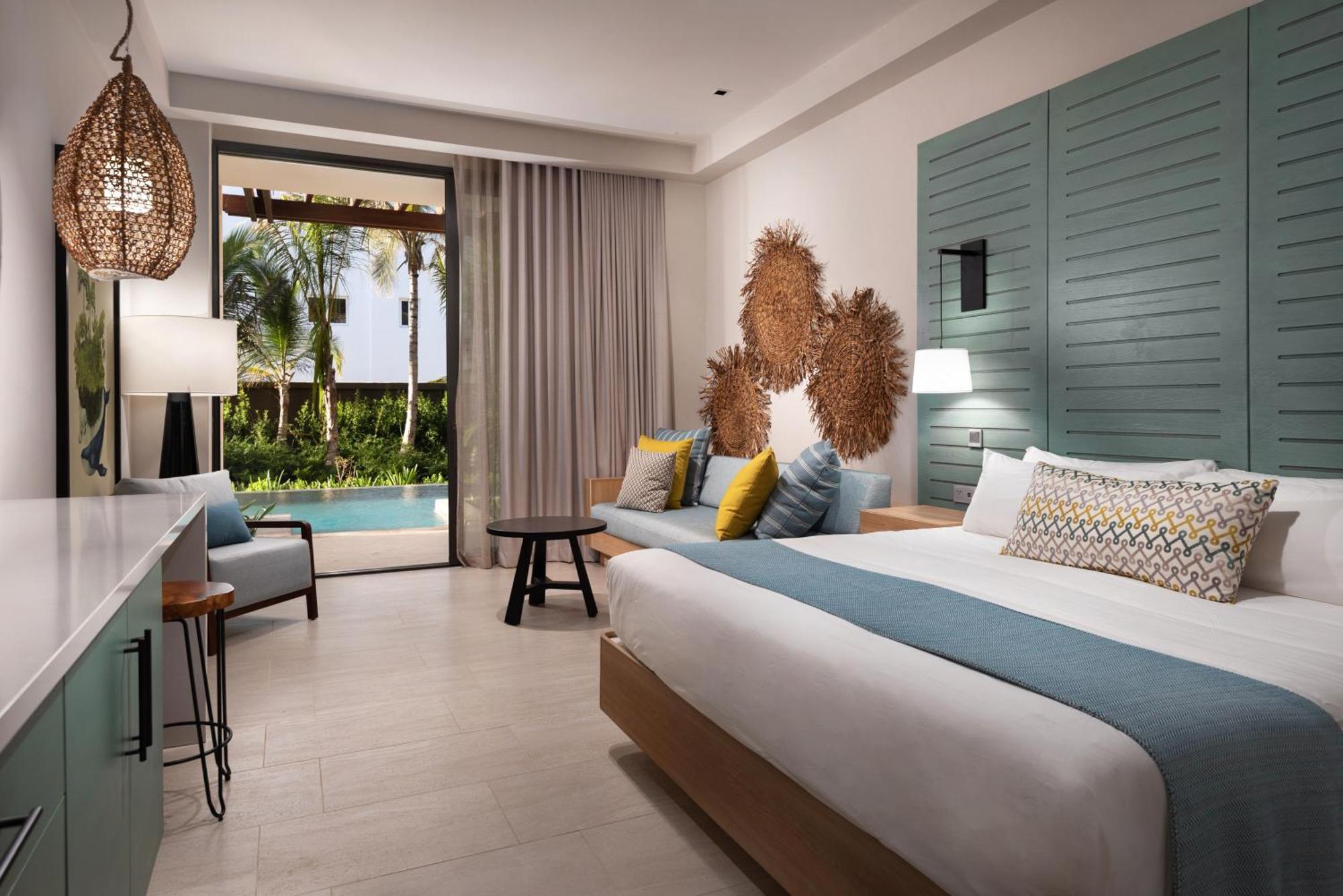 Suite Junior Resort con cama grande y vistas al mar