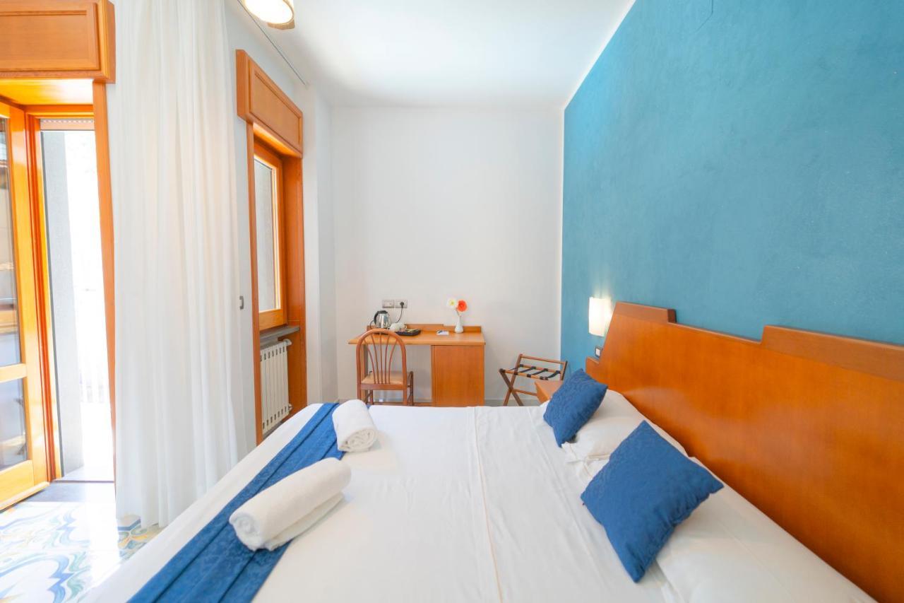 Quarto Família (2 Adultos + 2 Crianças)