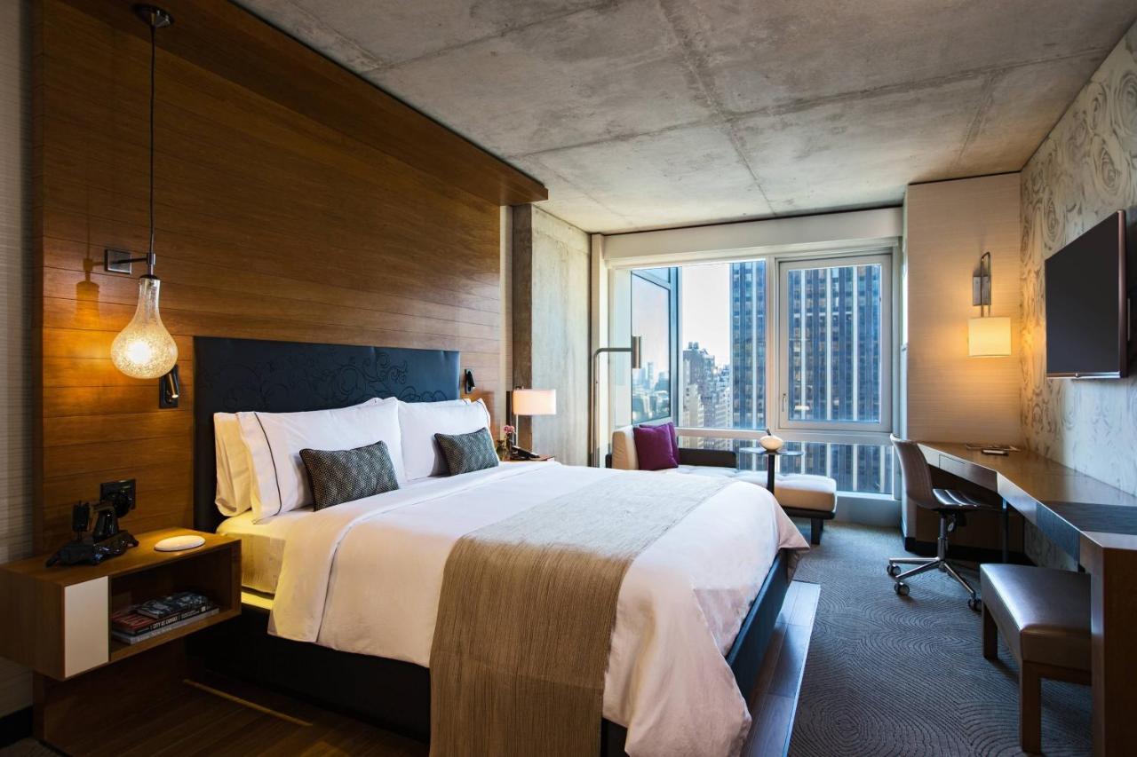 Kamer met Kingsize Bed en Uitzicht op de Stad