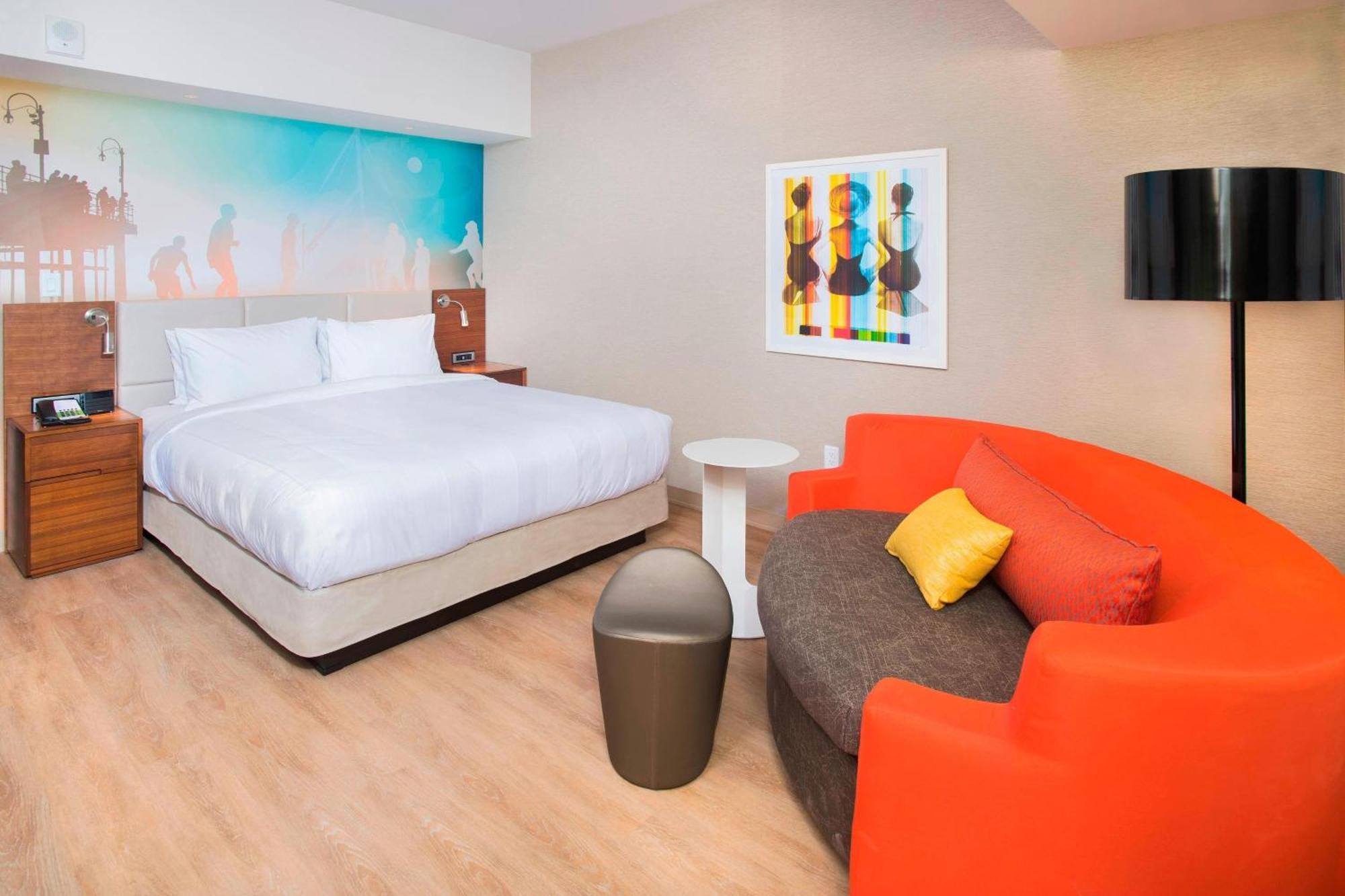 Quarto King com Sofá-cama