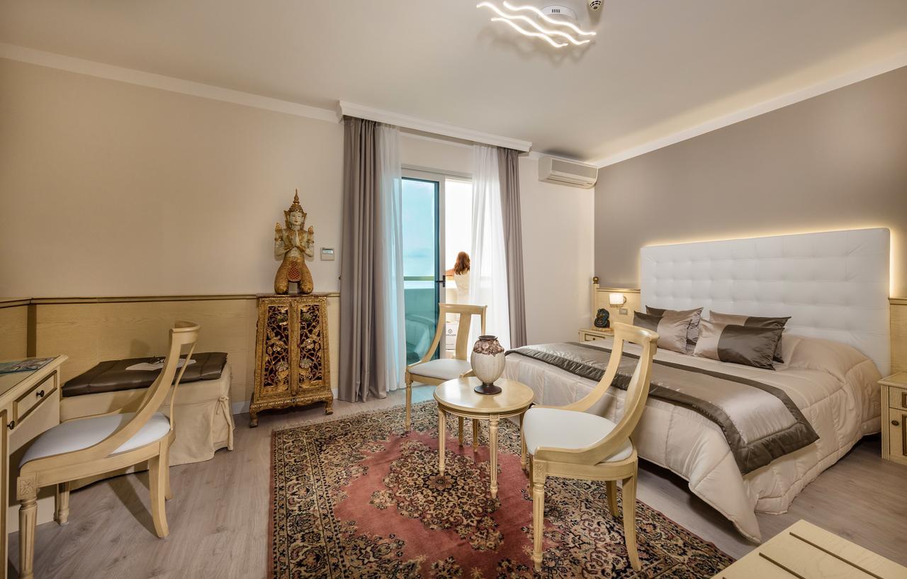 Junior Suite with Partial Sea View and Spa Access,665928516:JPEG