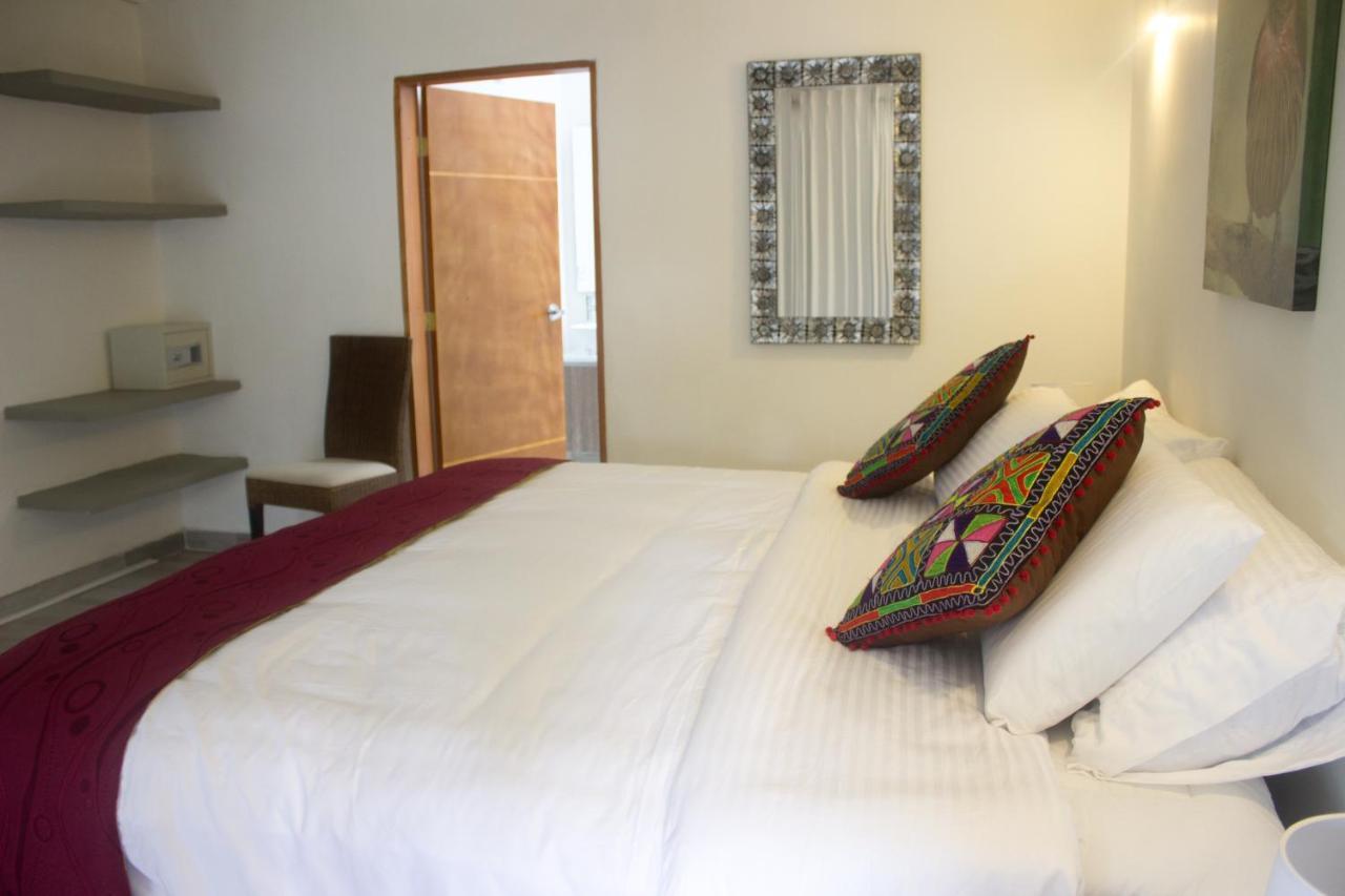 Habitación Doble Deluxe (2 adultos + 1 niño)